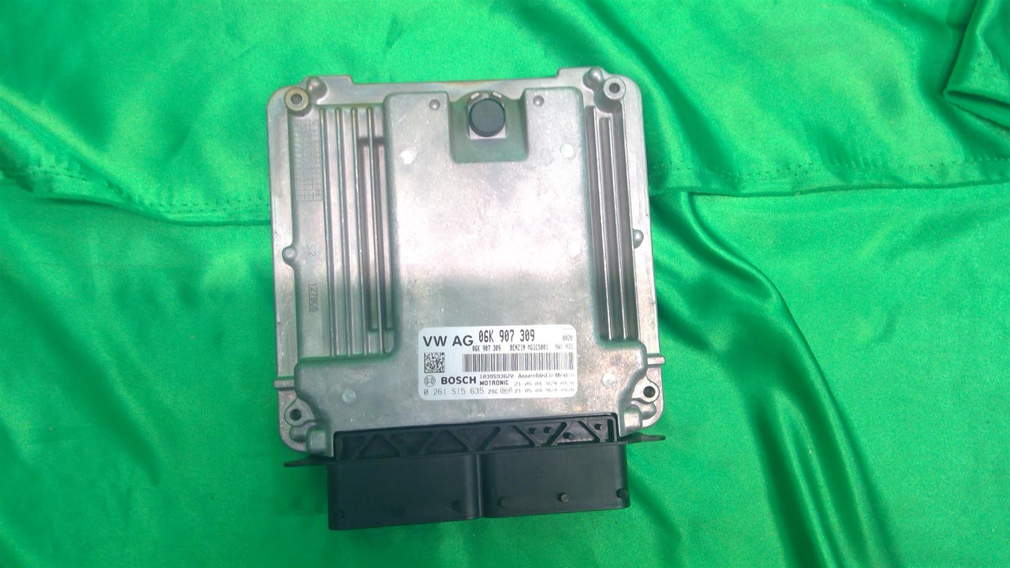 20-21 Passat EMC Contour Unit Used 06K906016G