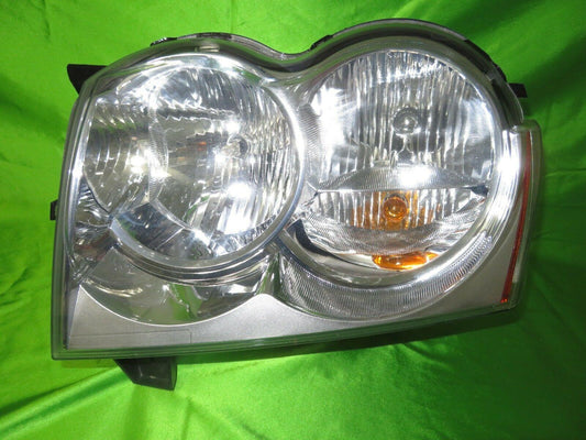 08-10 Grand Cherokee Left Headlight 55157483AE